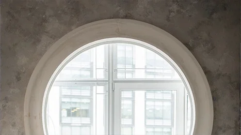 Decorative concrete around a white window in Seattle Downtown